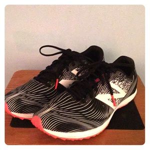 New Balance women’s spiked racing shoes